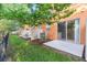 The view shows the back yard, patio, privacy fences, and air conditioner unit at 5060 Cypress Branch Pt, Oviedo, FL 32765