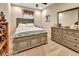 Comfortable bedroom with plush carpet, neutral walls, and a large gray dresser at 508 Morgan Wood Dr, Deland, FL 32724