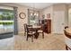 Cozy dining area with direct access to the outdoor pool and patio area at 508 Morgan Wood Dr, Deland, FL 32724