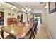 Elegant dining room with chandelier and beautiful archways leading to other living spaces at 508 Morgan Wood Dr, Deland, FL 32724