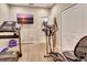 Exercise room with neutral walls and a television at 508 Morgan Wood Dr, Deland, FL 32724