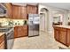 Spacious kitchen featuring stainless steel appliances, granite countertops, and ample cabinet space at 508 Morgan Wood Dr, Deland, FL 32724