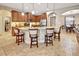 Modern kitchen with granite countertops, stainless steel appliances, and breakfast bar seating at 508 Morgan Wood Dr, Deland, FL 32724