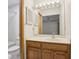 Bathroom features a double vanity, large mirror with lights, and a shower at 510 Sandy Bluff Trl, Deland, FL 32724