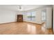 Bright, spacious bedroom with wood flooring, a ceiling fan, a window with view, and built in cabinet at 510 Sandy Bluff Trl, Deland, FL 32724