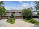 Charming townhome with manicured landscaping and a three-car driveway at 510 Sandy Bluff Trl, Deland, FL 32724
