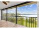 Screened patio offers scenic views of the lake at 510 Sandy Bluff Trl, Deland, FL 32724
