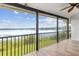 Relax on this screened patio with lake views and lots of sunshine at 510 Sandy Bluff Trl, Deland, FL 32724