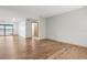 Open living area with wood-look floors and lake views at 510 Sandy Bluff Trl, Deland, FL 32724