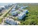 Aerial view of complex and ocean at 5300 S Atlantic Ave # 12-401, New Smyrna Beach, FL 32169