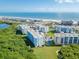 Beautiful aerial view showcasing the complex and ocean at 5300 S Atlantic Ave # 12-401, New Smyrna Beach, FL 32169