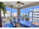 Spacious screened balcony offering stunning views and comfortable seating for outdoor enjoyment at 5300 S Atlantic Ave # 12-401, New Smyrna Beach, FL 32169