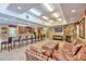 Inviting clubhouse featuring comfortable seating, a fireplace, and a wet bar, perfect for socializing and relaxation at 5300 S Atlantic Ave # 12-401, New Smyrna Beach, FL 32169