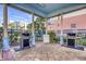 Outdoor grilling area with two stainless steel grills, providing a great space for residents and guests to cook and enjoy meals together at 5300 S Atlantic Ave # 12-401, New Smyrna Beach, FL 32169
