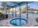 Outdoor hot tub with lounge chairs and a covered recreation area at 5300 S Atlantic Ave # 12-401, New Smyrna Beach, FL 32169