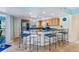 Eat in kitchen featuring bar seating, stainless appliances, and granite countertops at 5300 S Atlantic Ave # 12-401, New Smyrna Beach, FL 32169