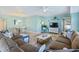 Cozy living room featuring modern decor, ample seating, and a relaxed atmosphere at 5300 S Atlantic Ave # 12-401, New Smyrna Beach, FL 32169