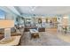 Open-concept living area seamlessly connects to the kitchen and dining space, perfect for entertaining at 5300 S Atlantic Ave # 12-401, New Smyrna Beach, FL 32169