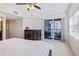 This main bedroom has balcony access and a window that lets in natural light at 5300 S Atlantic Ave # 12-401, New Smyrna Beach, FL 32169