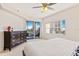 The main bedroom features balcony access with outdoor seating and a view at 5300 S Atlantic Ave # 12-401, New Smyrna Beach, FL 32169