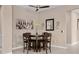 Cozy dining area with stylish decor, a ceiling fan, and neutral tones at 5648 Nw 40Th Loop, Ocala, FL 34482