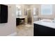 Neutral-toned bathroom with shower, tub, and vanity at 565 Morgan Wood Dr, Deland, FL 32724