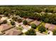 A charming single-Gathering home with lush landscaping and a convenient two-car garage at 565 Morgan Wood Dr, Deland, FL 32724