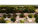Charming single-story home with well-maintained landscaping and a paved driveway at 565 Morgan Wood Dr, Deland, FL 32724