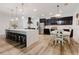 Bright kitchen with a large island, stainless steel appliances, and modern lighting at 565 Morgan Wood Dr, Deland, FL 32724