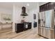 Kitchen with black appliances and stainless steel refrigerator at 565 Morgan Wood Dr, Deland, FL 32724
