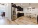Bright kitchen and dining area featuring stainless steel appliances at 565 Morgan Wood Dr, Deland, FL 32724