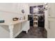 Functional laundry room with modern appliances and convenient counter space at 565 Morgan Wood Dr, Deland, FL 32724