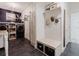 Mudroom features a bench, storage, and laundry appliances at 565 Morgan Wood Dr, Deland, FL 32724