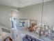 This view from the upper level showcases the dining room, living room, and kitchen at 5936 Boggs Ford Rd, Port Orange, FL 32127
