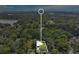 Aerial view of the property and surrounding neighborhood, showcasing lush greenery and residential tranquility at 626 Cannon St, Daytona Beach, FL 32114