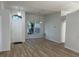 Bright living room with hardwood floors and a large window at 1693 Arash Cir, Port Orange, FL 32128