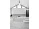Contemporary bathroom with a soaking tub, walk-in shower, and sleek marble tile floors at 202 Yorkville Pl, Debary, FL 32713