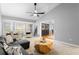 Comfortable living room with natural light and neutral decor, perfect for relaxing at 202 Yorkville Pl, Debary, FL 32713