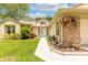 Exterior of home with brick accents, manicured lawn, and a well-maintained walkway leading to the front door at 212 Mallard Ln, Daytona Beach, FL 32119