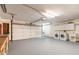 Spacious garage with washer, dryer, utility sink, and built in storage at 212 Mallard Ln, Daytona Beach, FL 32119