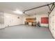 Spacious two car garage features ample lighting, storage and workspace at 212 Mallard Ln, Daytona Beach, FL 32119