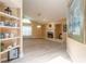 Spacious living room with a fireplace, built-in shelves, and modern flooring at 212 Mallard Ln, Daytona Beach, FL 32119