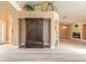 Elegant living room featuring a fireplace, decorative accents, and beautiful hardwood flooring at 212 Mallard Ln, Daytona Beach, FL 32119