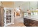 Open-concept layout showcases the modern kitchen and inviting living space with great natural light at 212 Mallard Ln, Daytona Beach, FL 32119