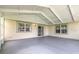 The screened porch is spacious and features a door to the outside at 212 Mallard Ln, Daytona Beach, FL 32119