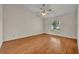 Bedroom with laminate wood flooring, a ceiling fan and a window at 2237 Clearwater Dr, Deltona, FL 32738
