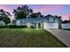 Well-maintained single-Gathering home with a beautiful lawn, perfect for families or anyone looking for a tranquil setting at 2237 Clearwater Dr, Deltona, FL 32738