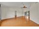 Bright and airy living room with wood-look tile flooring and ample natural light, perfect for relaxing and entertaining at 2237 Clearwater Dr, Deltona, FL 32738