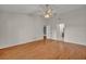 Main bedroom features laminate flooring, a ceiling fan, and two entryways at 2237 Clearwater Dr, Deltona, FL 32738