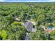 Sprawling property featuring mature trees and access to a private pond, offering a peaceful retreat at 28432 Tammi Dr, Tavares, FL 32778